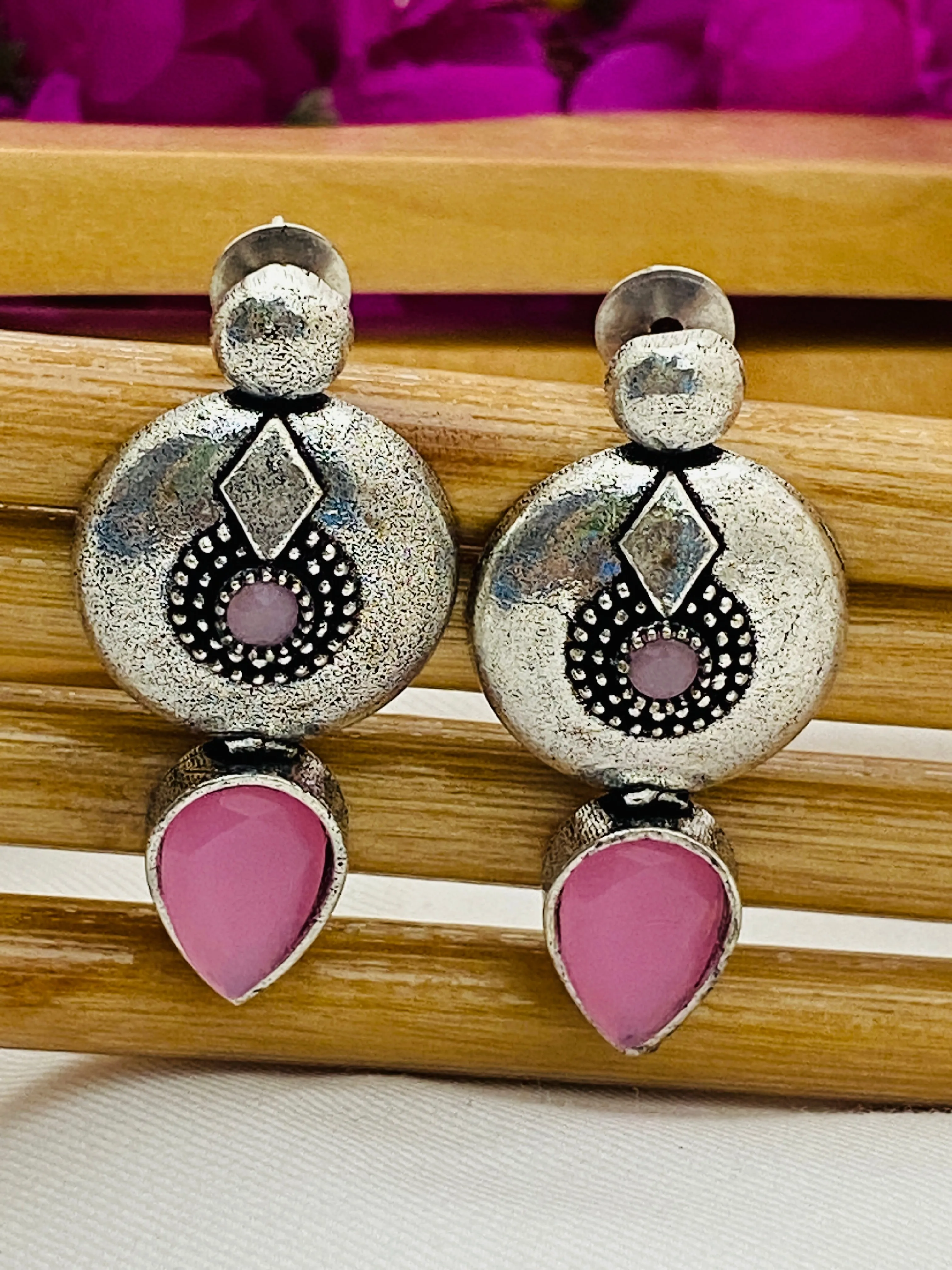 Magnificent Pink Stone Studded Designer German Silver Plated Designer Dangle Earrings
